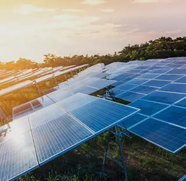 A sunset photo of the solar power plant in Ebino